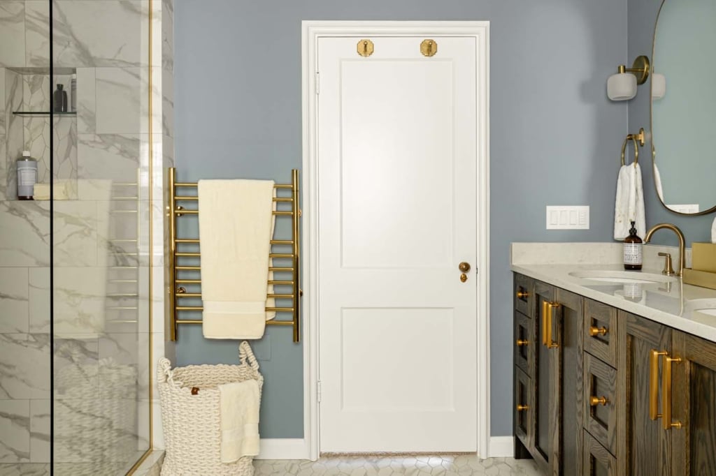 Gorgeous walking shower with amazing hardware and custom vanity