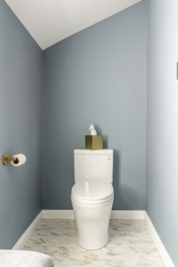 new toilet sits top beautiful geometric tile