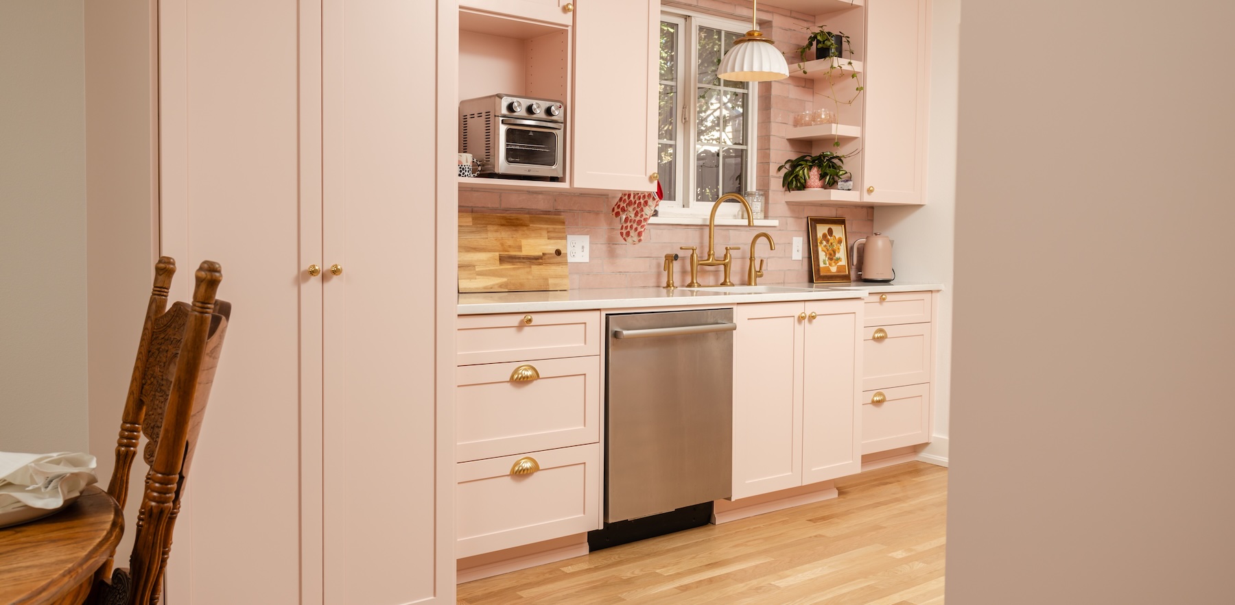 Remodeled condo kitchen with custom colors, cabinetry, appliances, and hardware
